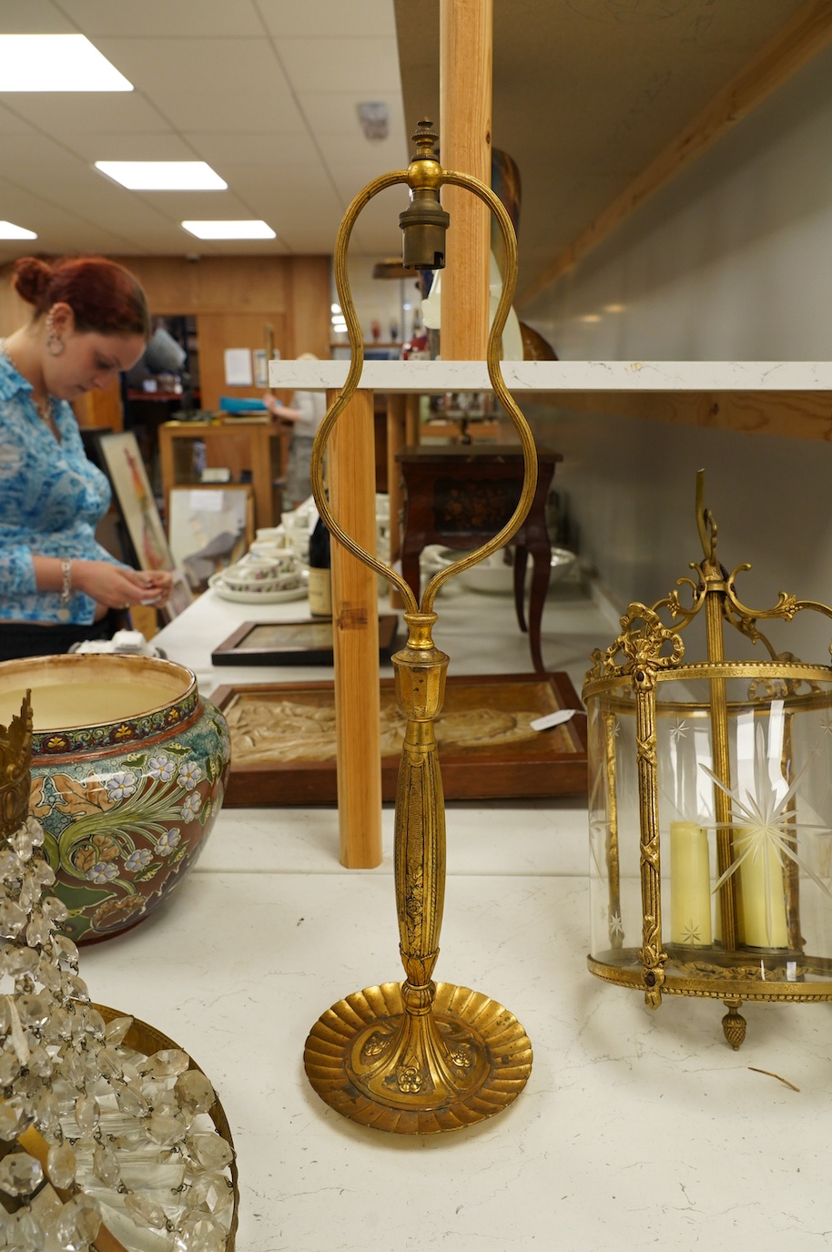 An Art Deco ormolu table lamp base, 59cm high. Condition - fair